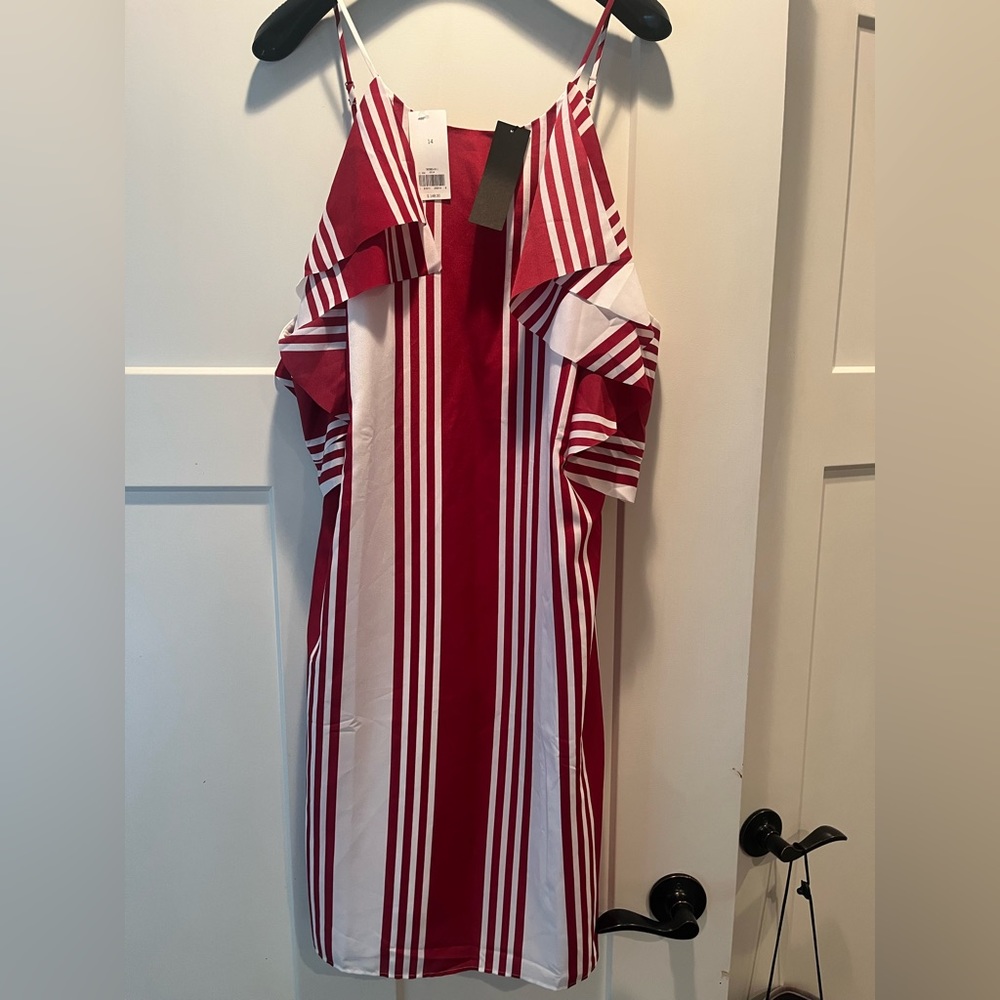 Brand new Banana Republic dress size 14 with tag. Burgundy & white mid length.